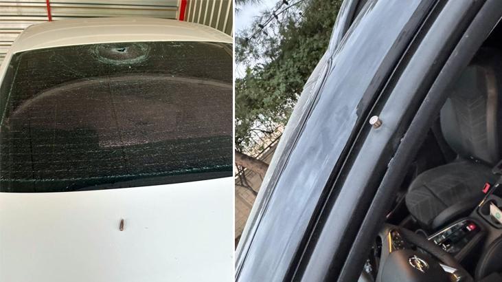 Mardin'de Suriye'den gelen yorgun mermiler araçlara isabet etti, 2 kişi de yaralandı