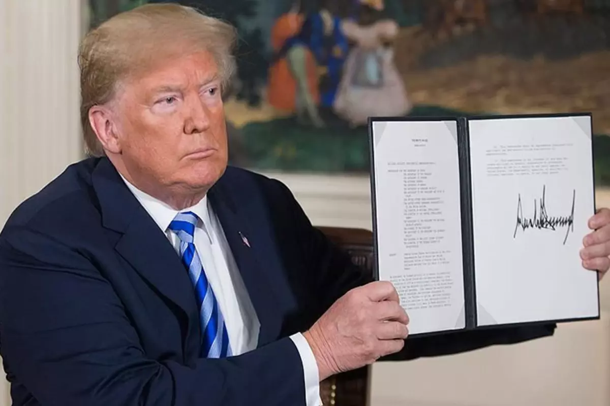 Trump'ın koltuğa oturur oturmaz imzaladığı kararname iptal edildi